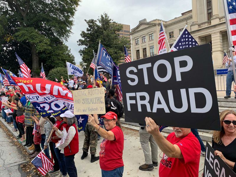Trump supporters rallied at the Georgia State Capitol Saturday after Joe Biden was announced as president-elect. (Ryon Horne / AJC)