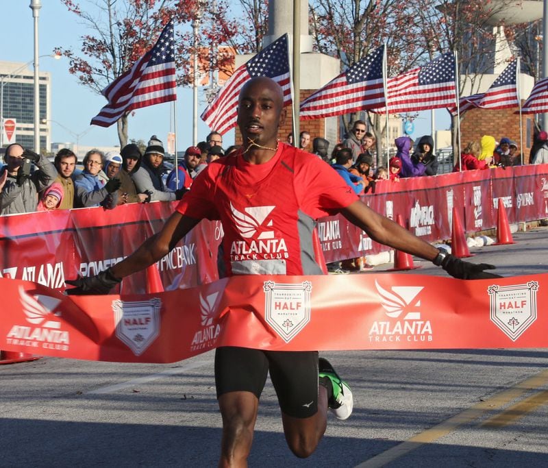 Kirubel Erassa (pictured) won the men's 5K. Lauren Sara won the women's event. Geraint Davis of Suwanee, who was last year's second-place finisher, won the half marathon with a time of 1:10:54. About 12,000 racers bundled up Thursday morning to take part in the Thanksgiving Day Half Marathon events in downtown Atlanta. The half marathon, 5K, one mile and 50-meter dash started and finished at Turner Field. Jill Braley of Rome broke the tape for the women in 1:18:47. She was also the female champion in 2013. BOB ANDRES / BANDRES@AJC.COM