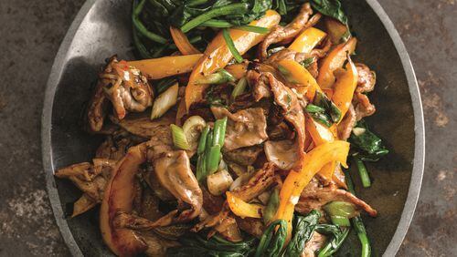 Monday’s Beef Stir-Fry With Spinach is served with brown rice. Credit: Houghton Mifflin Harcourt, 2016