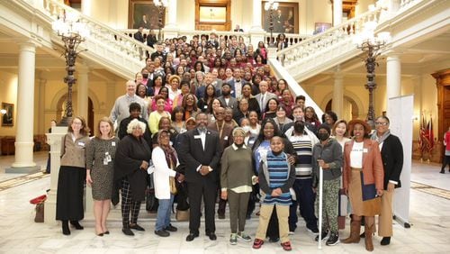 Housing advocates at the Georgia State Capitol on March 13, 2024
