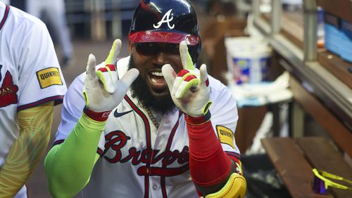 Atlanta Braves designated hitter Marcell Ozuna (20) celebrates after hitting a solo home run during the third inning against the Boston Red Sox at Truist Park, Wednesday, May 8, 2024, in Atlanta.  The Braves cruised 5-0. (Jason Getz / AJC)
