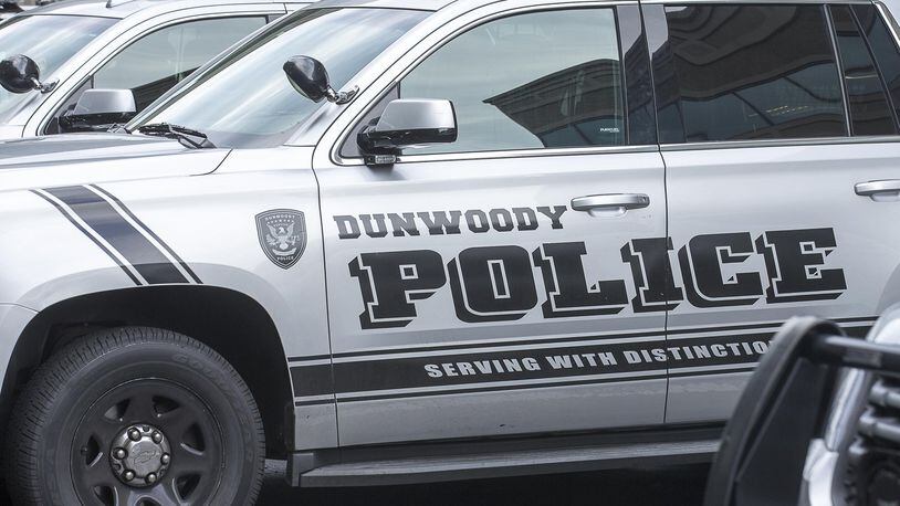 6/10/2019 — Atlanta, Georgia — Dunwoody police cars are parked outside of the City of Dunwoody municipal building, Monday, June, 10, 2019.