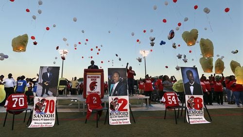Members of the Mumford and Sankoh families release balloons on the field at the conclusion of the Ibrahim Sankoh, Jerrett Mumford and Jaylen Mumford Memorial Service and Balloon Release at Banneker High School for three teens killed in a car accident. Jerrett and Jaylen Mumford, 18 and 16 years old, and Ibrahim Sankoh, 18 years old, died after their car crashed about 8:15 p.m. on Sunday Sept. 25, near the intersection of Buffington and Royal South Parkway in Union City after attending homecoming activities. Curtis Compton /ccompton@ajc.com