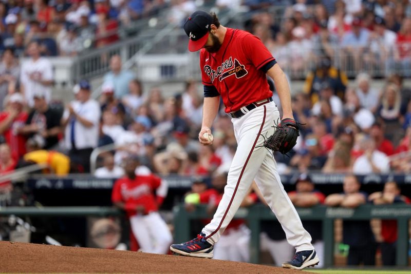 Braves starting pitcher Ian Anderson reacts after walking Los Angeles Dodgers first baseman Freddie Freeman (not pictured) during the first inning at Truist Park Friday, June 24, 2022, in Atlanta. (Jason Getz / Jason.Getz@ajc.com)