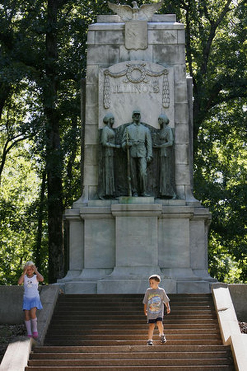 Jessica Peterson, 8, Nathanial Bintliff, 6, both of Marietta, walk along the steps of the imposing Illinois Monument, erected to the memory of the Illinois soldiers who died on the battlefield of Kennesaw Mountain, June 27, 1864. The Monument was erected 50 years after the battle.