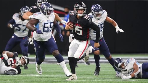 Falcons quarterback Feleipe Franks breaks loose for a long first down run against the Tennessee Titans during the fourth quarter Friday, Aug. 13, 2021, in Atlanta. (Curtis Compton / Curtis.Compton@ajc.com)