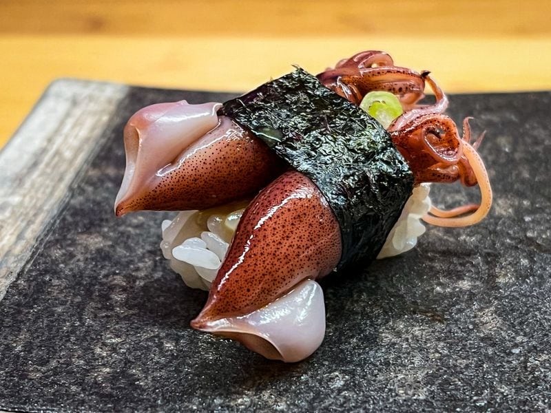 Firefly squid is a nigiri offering at Omakase by Yun. Henri Hollis/henri.hollis@ajc.com