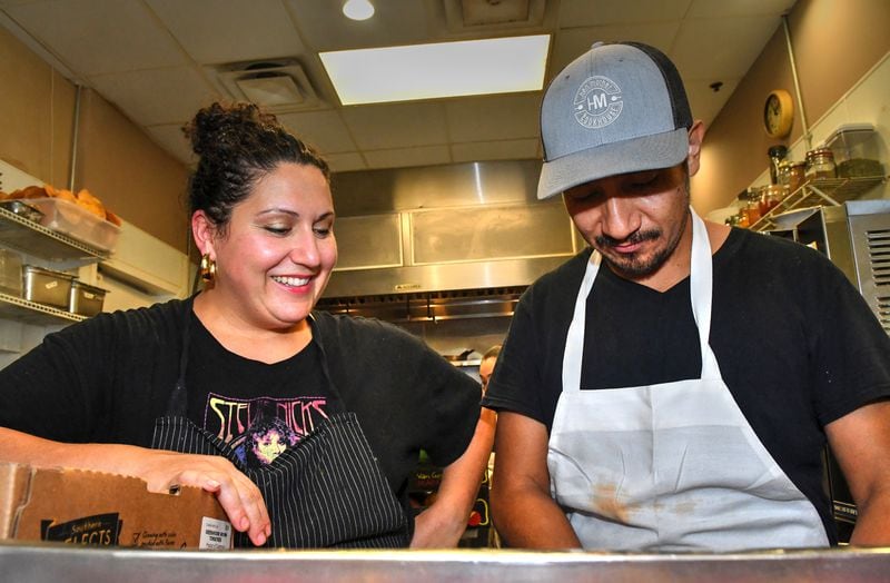 Khoury's husband Jesus Loyola, whom she met while working at Redd's in Napa, also cooks at Hen Mother Cookhouse.
(CHRIS HUNT FOR THE ATLANTA JOURNAL-CONSTITUTION)