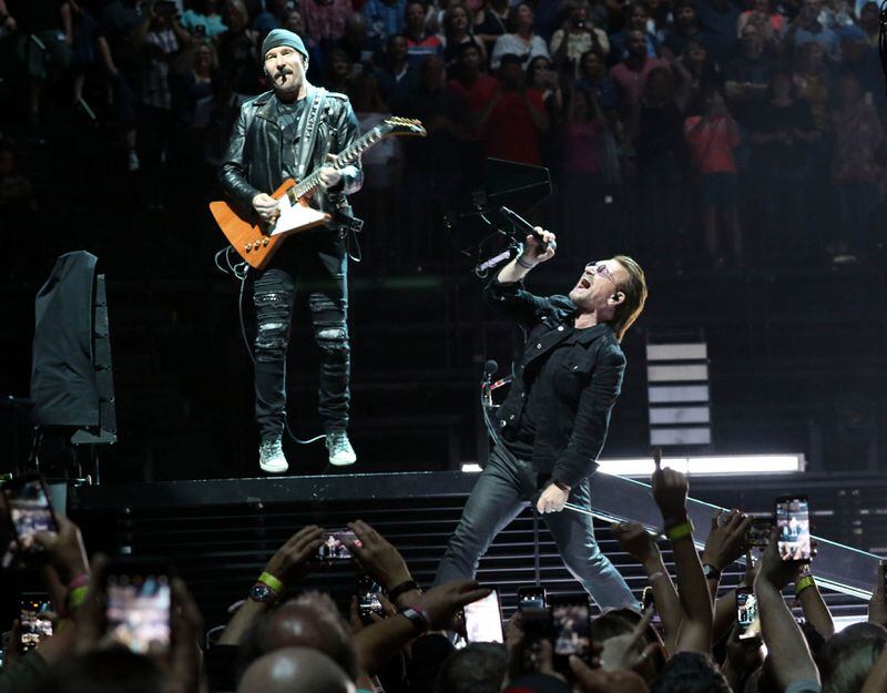  The Edge and Bono share a moment during the band's May 28, 2018 show at Infinite Energy Arena - U2's first Atlanta appearance in almost a decade. Photo: Robb Cohen Photography & Video /RobbsPhotos.com