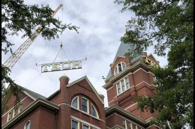 A crane lifts the new "TECH" sign that has been placed on the tower on Georgia Tech's campus. Georgia Tech’s enrollment increased by 11 percent this year, the largest increase in the University System of Georgia. Photo Credit: Georgia Tech