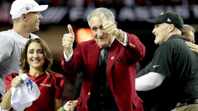  Atlanta Falcons owner Arthur Blank celebrates after defeating the Green Bay Packers with his wife, Angela Macuga, (left) in the NFC Championship Game at the Georgia Dome on January 22, 2017 in Atlanta. The Falcons defeated the Packers 44-21. (Streeter Lecka/Getty Images)