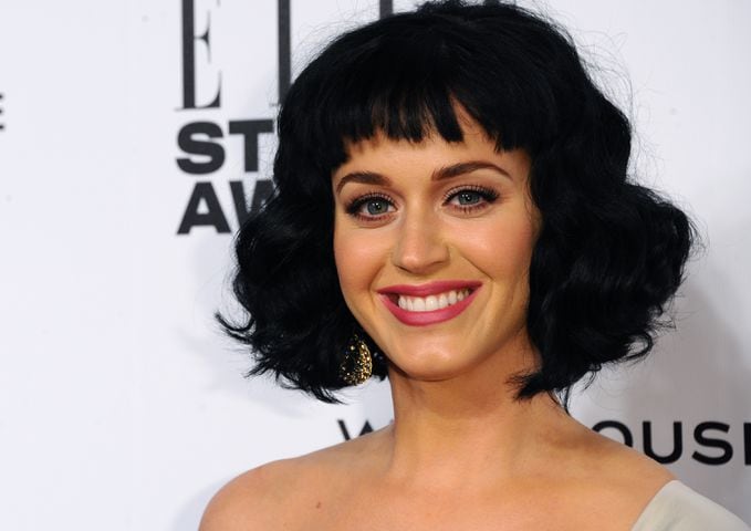 Katy Perry was allegedly caught puffing away on a cigarette in the ballroom of the Savoy Hotel at Warner’s Brits party.