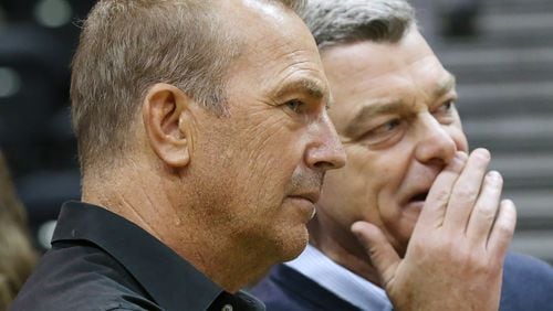Actor Kevin Costner and Hawks owner Tony Ressler look on before the Hawks' second-round playoff game against Cleveland Sunday at Philips Arena, which turned out to be their final game of the season. (Curtis Compton/ccompton@ajc.com)