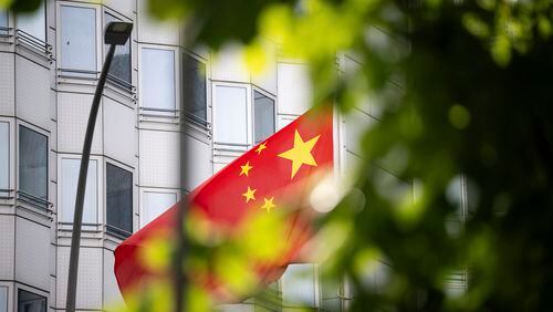 FILE - A country's flag flies in front of the embassy of China in Berlin, Germany, Monday, April 22, 2024. A man who works for a German lawmaker in the European Parliament was arrested on suspicion of spying for China, German prosecutors said Tuesday, April 23. (Hannes P. Albert/dpa via AP, File)