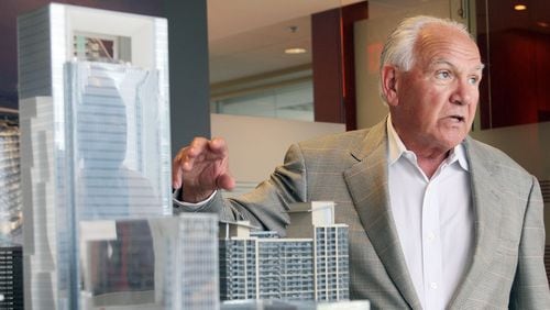 In 2010, developer Hal Barry stood over a mockup of the Allen Plaza project which he was developing downtown. Barry helped shape metro Atlanta development and mentored a number of developers who continue shaping the region. Barry died May 31.
Phil Skinner/ajc, pskinner@ajc.com