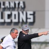 Falcons owner Arthur Blank (left) looks on as new head coach Arthur Smith makes a point as they take in the first day of practice during training camp Thursday, July 29, 2021, at the team's training facility in Flowery Branch. (Curtis Compton / Curtis.Compton@ajc.com)