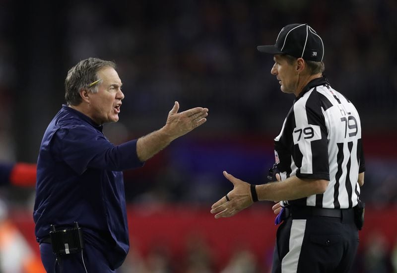 HOUSTON, TX - FEBRUARY 05: Head coach Bill Belichick of the New England Patriots disputes a call with head linesman Kent Payne #79 during the second quarter of Super Bowl 51 at NRG Stadium on February 5, 2017 in Houston, Texas. (Photo by Ronald Martinez/Getty Images)