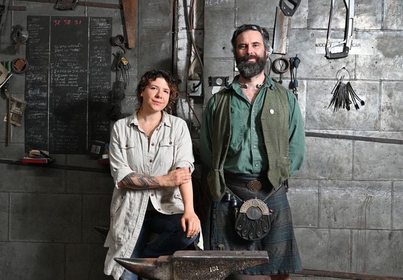 Mark Hopper and Jessica Collins, the loosely organized partnership that runs Goat N Hammer, is determined Atlanta will still be able to come to them to work metal and grind blades to their hearts' content. Hyosub Shin / Hyosub.Shin@ajc.com