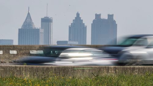 If your Memorial Day weekend plans include driving or catching a plane from Atlanta, you can expect company — and possible traffic delays. (John Spink / John.Spink@ajc.com)