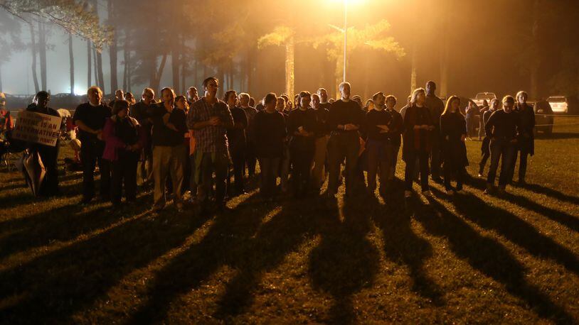 September 29, 2015 Jackson: Protesters sing songs into the night outside of Georgia Diagnostic Prison in Jackson on Tuesday evening September 29, 2015 before the scheduled execution of Kelly Gissendaner. Ben Gray / bgray@ajc.com