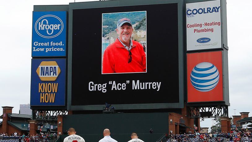 ATLANTA, GA - AUGUST 30: An American flag is lowered to half-staff in memory of a fan, Greg "Ace" Murrey, who fell to his death at the game between the Atlanta Braves and the New York Yankees on August 29, 2015, at Turner Field on August 30, 2015 in Atlanta, Georgia. (Photo by Kevin C. Cox/Getty Images)
