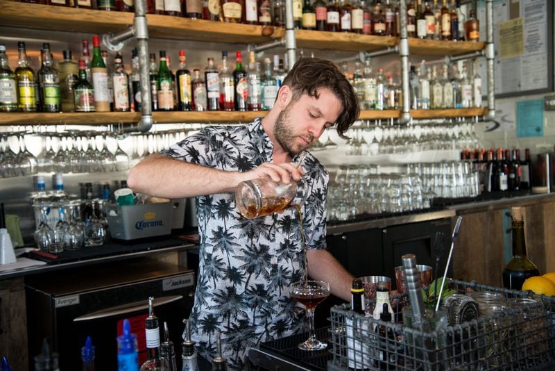  Jonathan Joy, beverage director of BlueTop, preparing 0 Ducks Given cocktail. Photo credit- Mia Yakel.