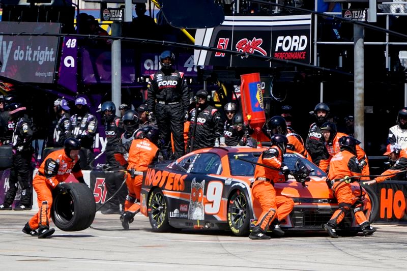 Chase Elliott pits during a NASCAR Cup Series auto race at Texas Motor Speedway in Fort Worth, Texas, Sunday, April 14, 2024. (AP Photo/Larry Papke)