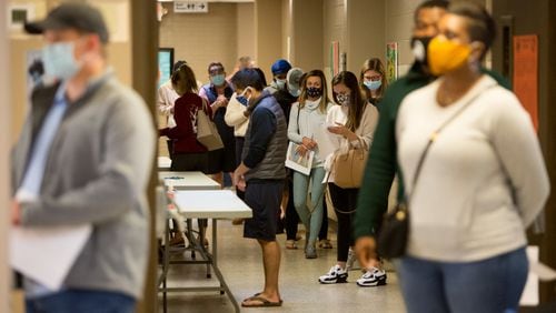 Voters wait to cast their ballots at Lynwood Recreation Center in Brookhaven on the last day of Early voting. PHIL SKINNER FOR THE ATANTA JOURNAL-CONSTITUTION