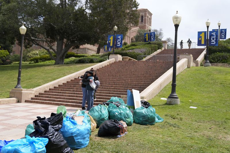 Trash is piled up at the site of a pro-Palestinian encampment which was cleared by police overnight on the UCLA campus, Thursday, May 2, 2024, in Los Angeles. (AP Photo/Ashley Landis)