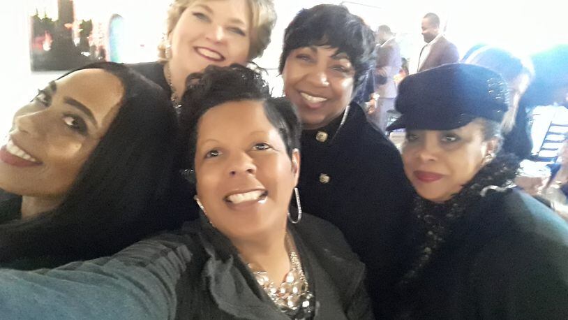 Founder Angie Sims (center foreground) with members of the League of Girlfriends. (Courtesy of Angie Sims)