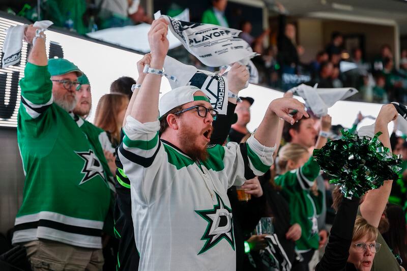 Spectators react during the third period in Game 7 of an NHL hockey Stanley Cup first-round playoff series between the Dallas Stars and the Vegas Golden Knights, Sunday, May 5, 2024, in Dallas. (AP Photo/Brandon Wade)