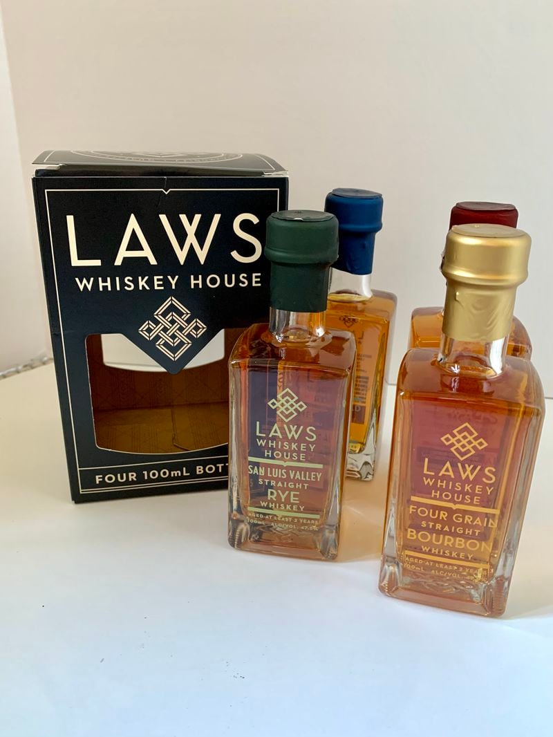 A sampler box from Laws Whiskey House comes with four 100-milliliter bottles of different whiskeys.
Angela Hansberger for The Atlanta Journal-Constitution