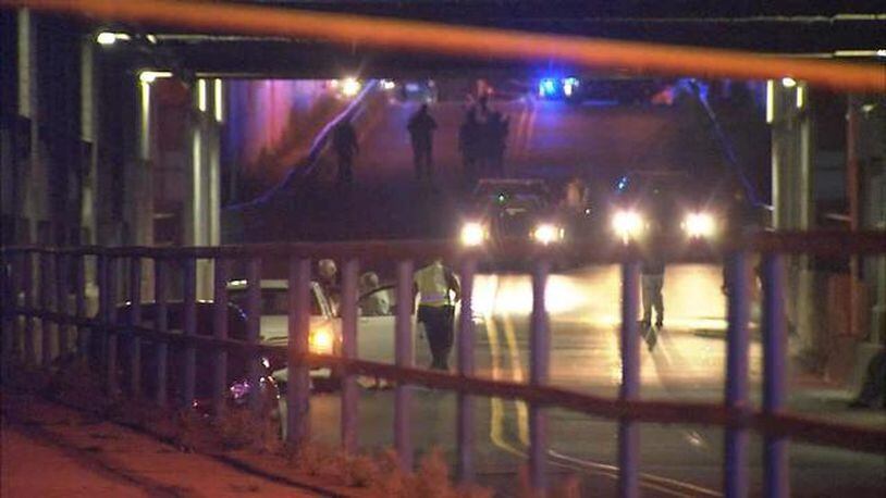 A woman died after falling from a bridge and getting hit by a car in northeast Atlanta Saturday, May 7, 2016. (Credit: Channel 2 Action News)