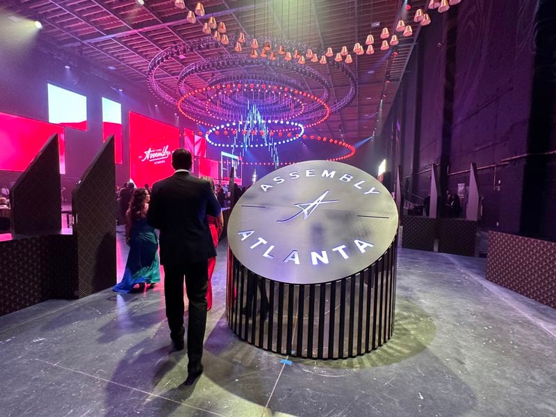 The Assembly invite-only opening gala Oct. 21, 2023 in Doraville was an extravagant affair with an entire sound stage turned into a light show with massive screens and open bar. RODNEY HO/rho@ajc.com