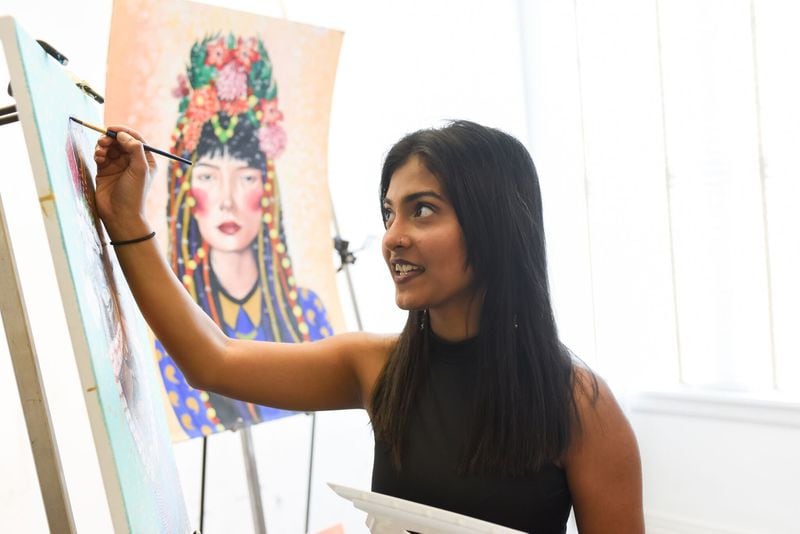 Tanvi Lonkar, who starred in the 2008 hit movie “Slumdog Millionaire,” recently rediscovered her love for art at Georgia College & State University. The college senior is using her paintings, on display at the school, to empower women. CONTRIBUTED