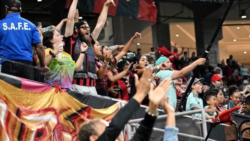 Atlanta United fans react after Atlanta United’s midfielder Nick Firmino scored to tie the game at the end of the second half in a MLS soccer match at Mercedes-Benz Stadium, Wednesday, June 21, 2023, in Atlanta. (Hyosub Shin / Hyosub.Shin@ajc.com)