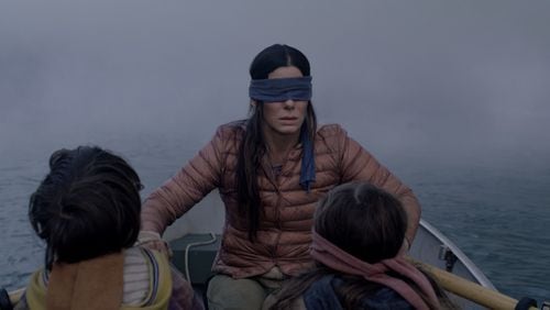 Sandra Bullock doesn't want to see as she leads a rescue in "Bird Box."