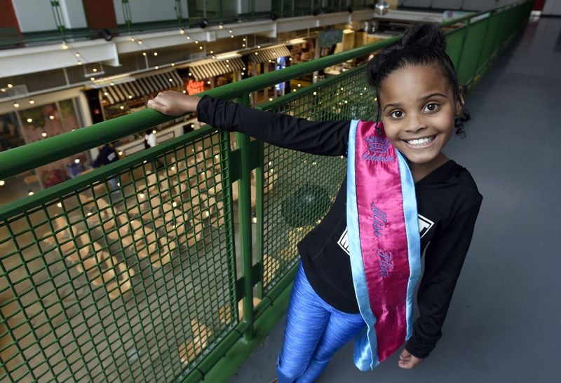 Mari Copeny, seen here in 2016 wearing her “Miss Flint” sash, wrote a letter to President Barack Obama about the water crisis in Flint, Mich., which prompted a visit from the president. STEVE PEREZ / DETROIT NEWS VIA AP