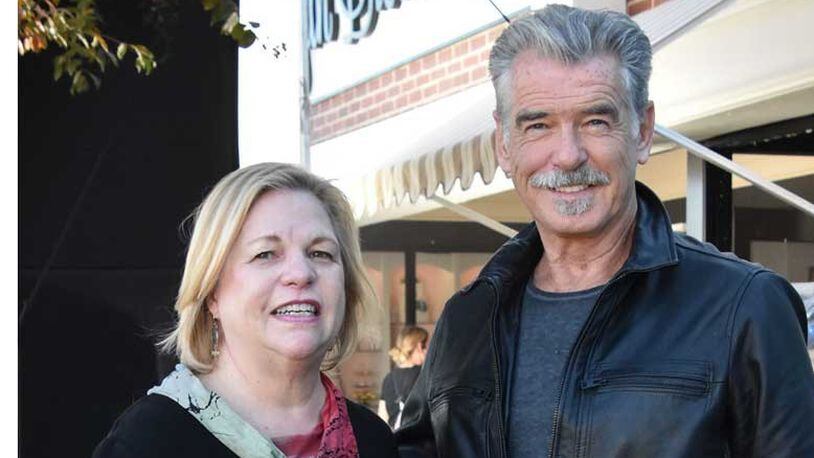 Tucker City Manager Tami Hanlin met former James Bond actor Pierce Brosnan on the set of his new film "The Out-Laws" that was filmed in Tucker. (Courtesy of city of Tucker)