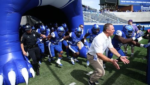 October 21, 2017 - Atlanta, Ga: Georgia State Panthers head coach Shawn Elliott runs onto the field with players before their game against the Troy Trojans at GSU Stadium Saturday, October 21, 2017, in Atlanta.. PHOTO / JASON GETZ