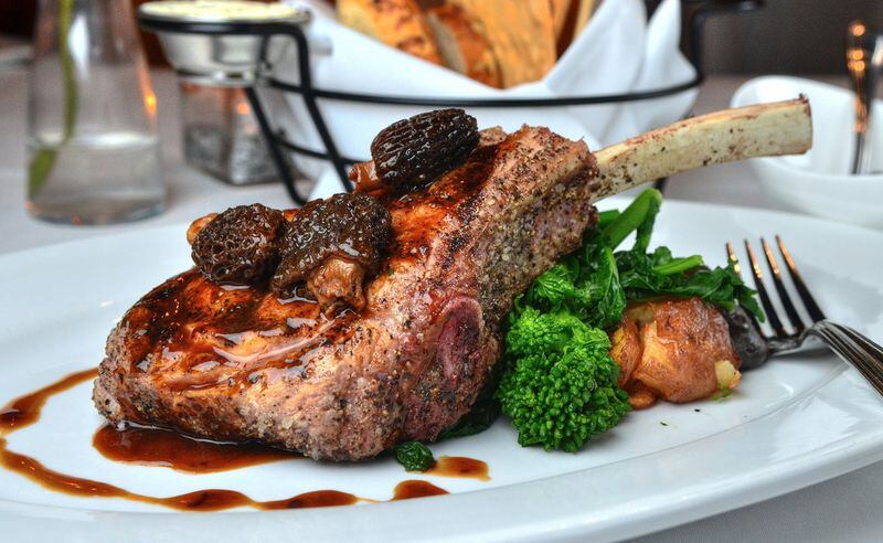 The cowboy-cut veal chop at Osteria di Mare is a memorable dish. CHRIS HUNT / SPECIAL