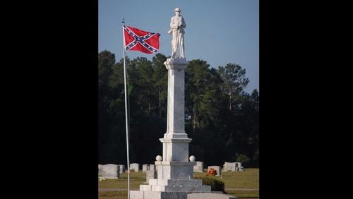 The figure standing atop the Confederate monument in the Screven County Memorial Cemetery at Sylvania resembles another Confederate statue in McDonough. Both were mass-produced by McNeel Marble Company in Marietta. This McNeel monument was dedicated in 1909.