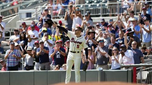 Freddie Freeman  waves to the crowd as he leaves Sunday’s game against the Philadelphia Phillies in the second inning.