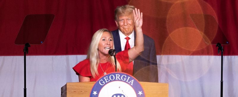 U.S. Rep. Marjorie Taylor Greene shares the stage with Former President Donald Trump during the GOP Convention at the Columbus Georgia Convention & Trade Center shown on Saturday, June 10, 2023. (Natrice Miller/natrice.miller@ajc.com)