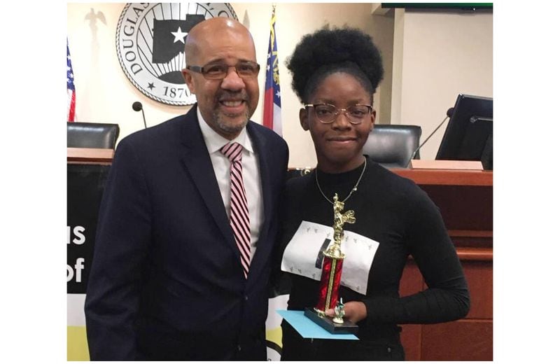 Douglas County schools superintendent Trent North, left, is one of four finalists for National Teacher of the Year. He is pictured in 2020 with Chisa Ihekwereme, then an 8th grader at Mason Creek Middle School. (Courtesy photo)