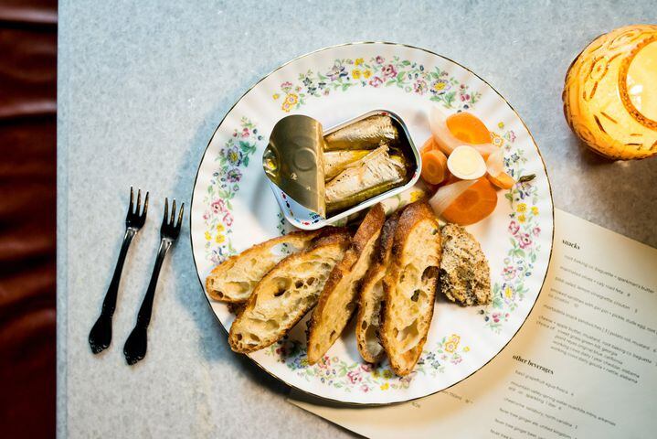 Cardinal smoked sardines with piri piri and pickle, dude egg, and root baking co. crostini. Photo credit- Mia Yakel.