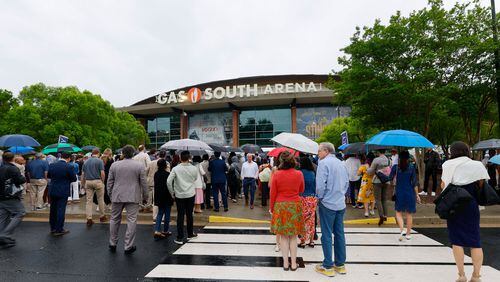 Family members and friends stand in line to go through security for Emory University's 179th Commencement ceremony at Gas South Arena on Monday, May 13, 2024, in Duluth. 
(Miguel Martinez / AJC)