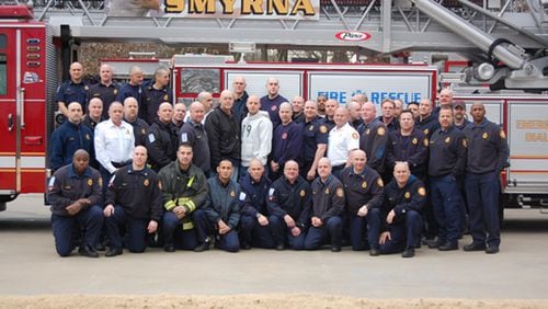 Smyrna firefighter shaved their heads in support of a colleague battling cancer.