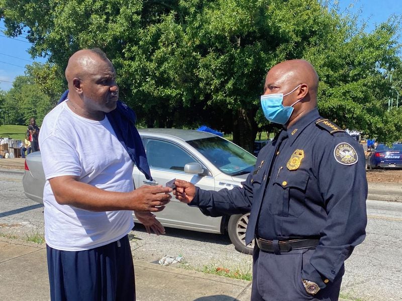 Atlanta Police Department cops handed out hundreds of $50 Kroger gift cards July 16 thanks to Tyler Perry.