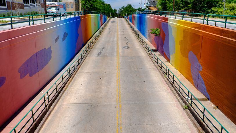 Living Walls Photography By Joshua Gwyn Last year Atlanta-based public art organization Living Walls recruited New Orleans artist MOMO and 50 volunteers to paint the Boulevard underpass. The mural has now been included in the Google Street Art Project.